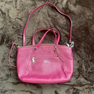 Coach smaller dark pink  purse.